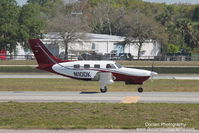 N10DK @ KSRQ - Piper Malibu Mirage (N10DK) taxis at Sarasota-Bradenton International Airport