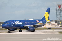 N775JB @ KSRQ - JetBlue Flight 163 (N775JB) Vets in Blue arrives at Sarasota-Bradenton International Airport following flight from John F Kennedy International Airport - by Donten Photography