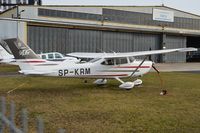 SP-KRM @ EPBC - Standing in front of IBEX hangar. - by Eryk Strzała