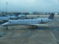 N12528 @ IAH - ERJ-135LR - by Christian Maurer