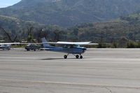 N704JH @ SZP - 1976 Cessna 150M, Continental O-200 100 Hp, landing roll Rwy 22 - by Doug Robertson