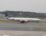 LN-RKG @ RJAA - Taxying for departure - by Keith Sowter
