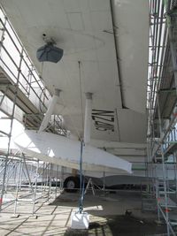 NZ4115 - now under scaffold and wrap protection outside MOTAT main hangar - by magnaman