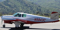 N5043C @ SZP - 1950 Beech B35 BONANZA, Continental E225 upgrade, tip tanks, taxi to Rwy 22 - by Doug Robertson