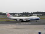 B-18721 @ NRT - Taxying for departure - by Keith Sowter