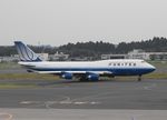N104UA @ NRT - Taxying for departure - by Keith Sowter