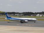 JA617A @ NRT - Taxying for departure - by Keith Sowter