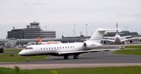 N360LA @ EGCC - taxing in to the [FBO] exc ramp - by andysantini