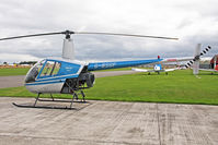 G-BSGF @ EGBR - Robinson R22 Beta at Breighton Airfield's Helicopter Fly-In. September 13th 2009. - by Malcolm Clarke