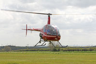 G-WIZR @ X5FB - Robinson R22 Beta II at Fishburn Airfield UK. May 10th 2017. - by Malcolm Clarke