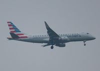 N245NN @ KDFW - At DFW. After a 45 minute hold because of severe storms, starting to land in heavy rain. - by paulp