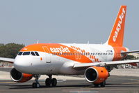 G-EZDN @ LMML - A319 G-EZDN with special Amsterdam markings for Easyjet - by Raymond Zammit