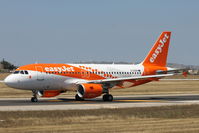 G-EZDN @ LMML - A319 G-EZDN with special Amsterdam markings for Easyjet - by Raymond Zammit