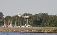 C-FJES @ CYTZ - landing at toronto airport - by olivier Cortot