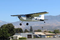 N449 @ SZP - 1969 Cessna 180H SKYWAGON, Continental O-470-A 225 Hp, first year of SKYWAGON production, on final with flaps for Rwy 22L grass - by Doug Robertson