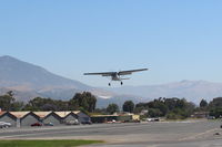 N449 @ SZP - 1969 Cessna 180H SKYWAGON, Continental O-470-A 225 Hp, on final for Rwy 22L grass - by Doug Robertson