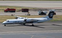 N433QX @ KPDX - DHC-8-402