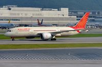 VT-ANO @ VHHH - Air India B778 taxying to it's gate. - by FerryPNL