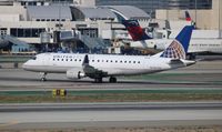 N117SY @ LAX - United Express - by Florida Metal