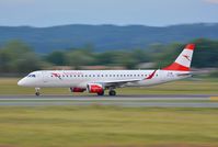 OE-LWJ @ LOWG - Austrian Airlines taking off at LOWG, Graz with a blurry background - by Paul H