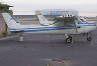 N47081 @ KOAK - Rather forlorn 1979 Cessna 152 minus engine (fleet # 24) @ Oakland International Airport, CA - by Steve Nation