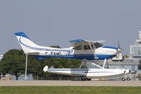 C-FAWL @ KOSH - Cessna 182 departing Airventure - by Eric Olsen