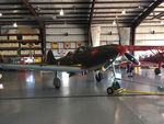 N6968 @ OSH - Getting towed out of the hangar after it's nose wheel was serviced. 1943 Bell P-39Q Airacobra, c/n: 219597 - by Timothy Aanerud