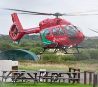G-WENU @ EGFH - Visiting Wales Air Ambulance helicopter (Helimed 57). - by Roger Winser