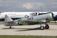 N7980C @ KOSH - North American SNJ-5 Texan Miss TLC/Precious  C/N 43938, N7980C - by Dariusz Jezewski www.FotoDj.com