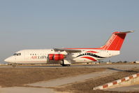 5A-FLA @ LMML - Bae 146-RJ100 5A-FLA Air Libya - by Raymond Zammit