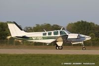 N11EC @ KOSH - Beech 58 Baron  C/N TH-128, N11EC - by Dariusz Jezewski www.FotoDj.com