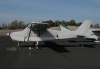 N9828T @ KAUN - Locally-based straight tail 1960 Cessna 172A Skyhawk under cover @ Auburn Municipal Airport, CA - by Steve Nation