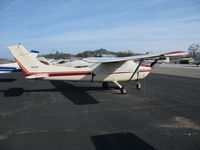 N182WF @ KAUN - Locally-based 1976 Cessna 182P Skylane under cover @ Auburn Municipal Airport, CA - by Steve Nation