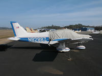 N8288Z @ KAUN - Locally-based 1980 Piper PA-28-161 Warrior II under cover @ Auburn Municipal Airport, CA - by Steve Nation