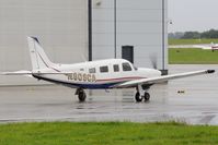 N808CA @ EGSH - Return visitor in the rain. - by keithnewsome