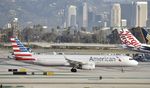 N127AA @ KLAX - Taxiing to gate at LAX - by Todd Royer