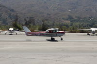 N714HH @ SZP - 1977 Cessna 150M, Continental O-200 100 Hp, another takeoff roll - by Doug Robertson