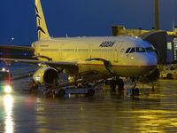 SX-DVZ @ LFPG - under the rain, at CDG terminal T1, hub Aegean - by JC Ravon - FRENCHSKY