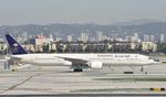 HZ-AK39 @ KLAX - Taxiing to gate at LAX - by Todd Royer