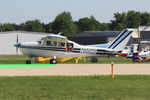 N3311S @ OSH - 1969 Cessna 210J, c/n: 21059111, EAA's Photo Airplane - by Timothy Aanerud