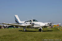 N43MC @ KOSH - Beech A56TC Baron  C/N TG-85, N43MC - by Dariusz Jezewski www.FotoDj.com