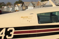 N58143 @ SZP - 1985 Mooney M20J 201, Lycoming IO-360-A&C 200 Hp, logo closeup - by Doug Robertson