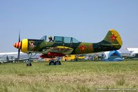 N152JB @ KOSH - Yakovlev (Aerostar) Yak-52  C/N 811403, N152JB - by Dariusz Jezewski www.FotoDj.com