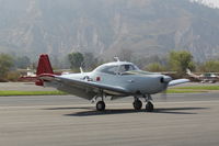 N91720 @ SZP - 1947 North American NAVION as L-17A, Continental E-185, many mods, taxi off the active - by Doug Robertson