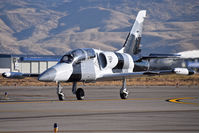N135EM @ KBOI - Taxiing on Foxtrot.  Black Diamond Jet Team. - by Gerald Howard