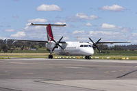 VH-SBV @ YSWG - QantasLink (VH-SBV) Bombardier DHC-8-315Q Dash 8, in new QantasLink new roo livery, taxiing at Wagga Wagga Airport - by YSWG-photography