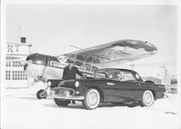 N3869V - 1949 Cessna 195 belonging to Cassius D. McCormick of Muncie, Indiana pictured here at Muncie Airport in February of 1952 with his Ford Thunderbird. - by Taken as part of an ad campaign. Family photo - original.