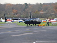 G-HALS @ EGTR - Robinson R44 Raven II at Elstree. - by moxy
