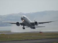 B-KQO @ NZAA - wet runway for departure - by magnaman