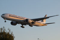 9V-SWY @ EGLL - On approach at sunrise. - by Howard J Curtis